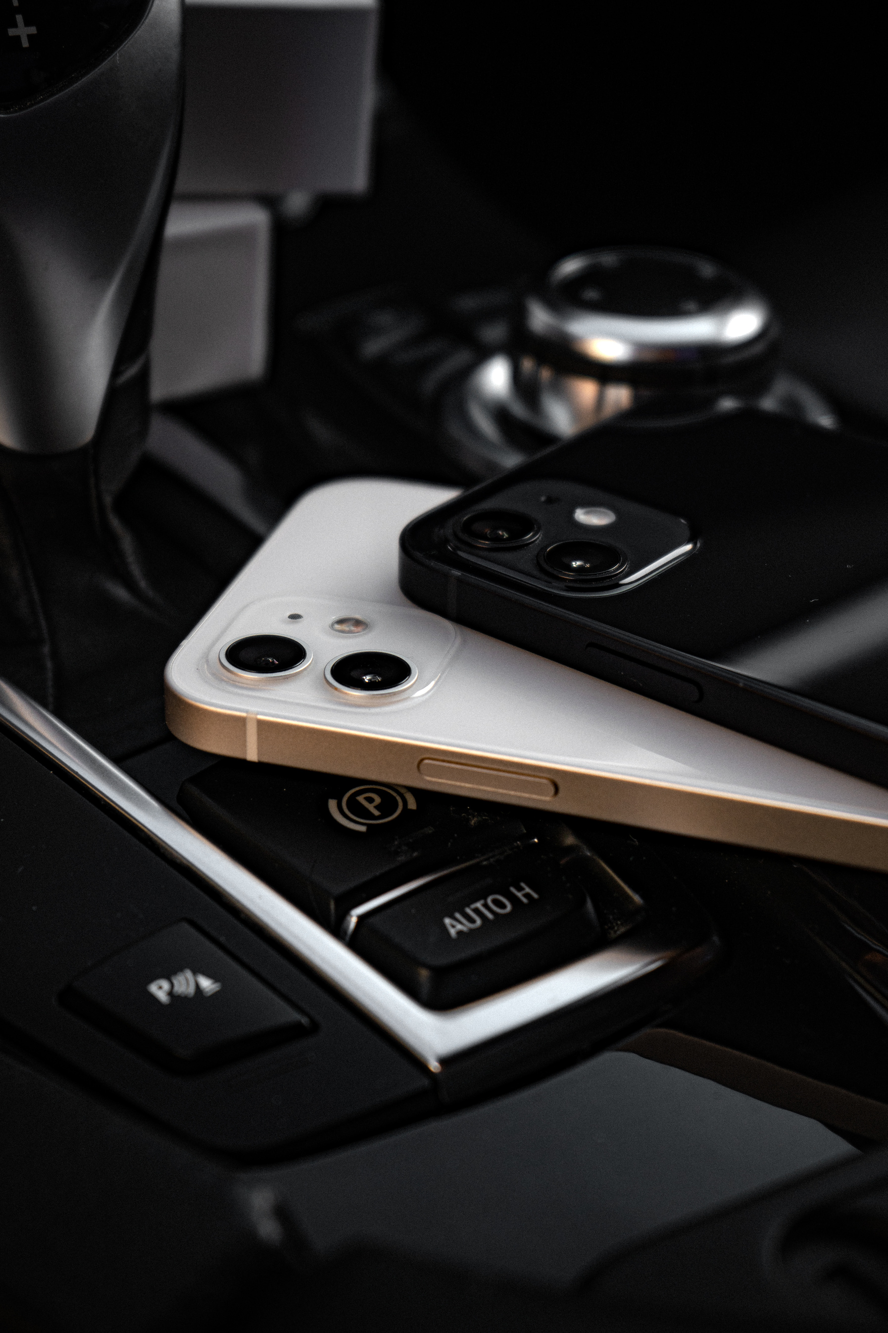 A Close-Up of White and Black iPhones